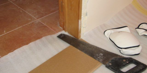 Dokončení dveří laminátem: jak položit podlahu na křižovatce vlastními rukama